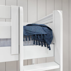 White bunk bed with a blue fringed throw blanket in a modern, minimalistic bedroom setting.