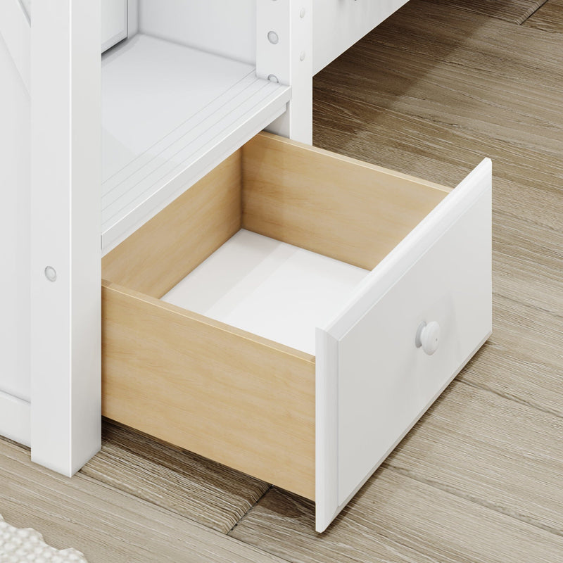 Open white dresser drawer with light wood interior and round white knob on light hardwood floor, close-up bedroom storage detail