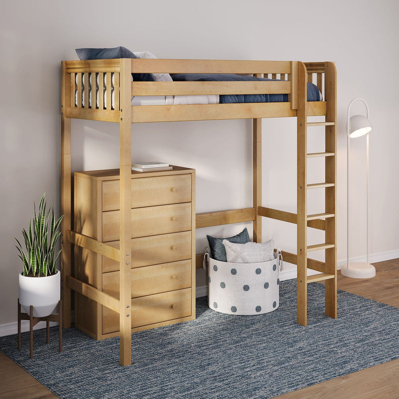 Natural wood loft bed with ladder and built-in drawers, blue bedding and rug, floor lamp and storage basket in modern kids' bedroom