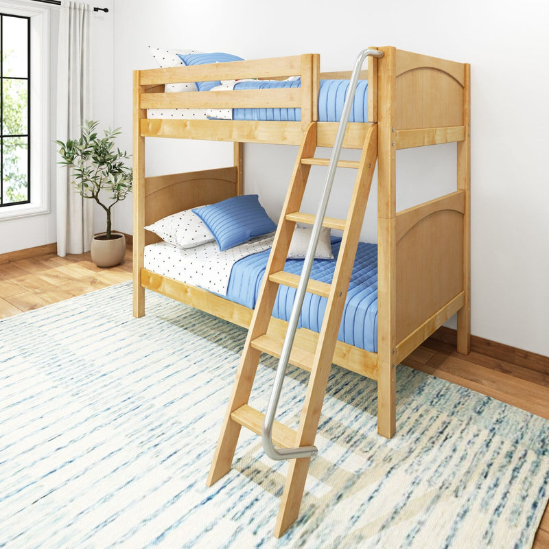 Natural wood twin-over-twin bunk bed with blue bedding and ladder in a bright, modern kids' bedroom — space-saving design