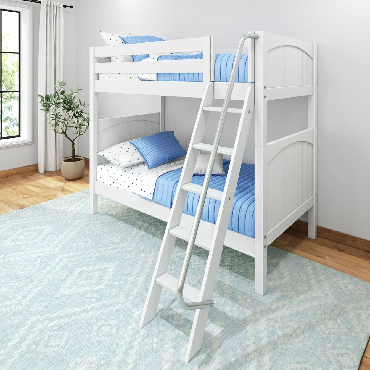White wooden bunk bed with ladder and blue bedding in a cozy bedroom setting.