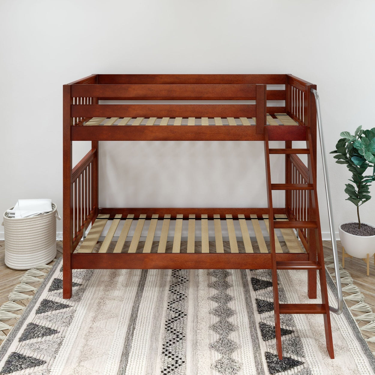 Wooden bunk bed frame with ladder in modern bedroom setting, featuring cozy rug and indoor plant.