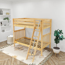 Wooden bunk bed with ladder in modern bedroom setting, featuring plant, shelf, and decorative rug.