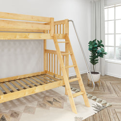 Wooden bunk bed with ladder and slide in a bright room with large window and potted plant.