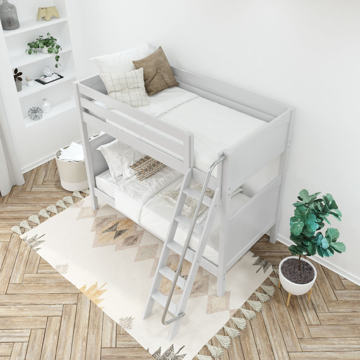 Modern white bunk bed in a stylish children's room with cozy bedding, decorative pillows, and a geometric rug.