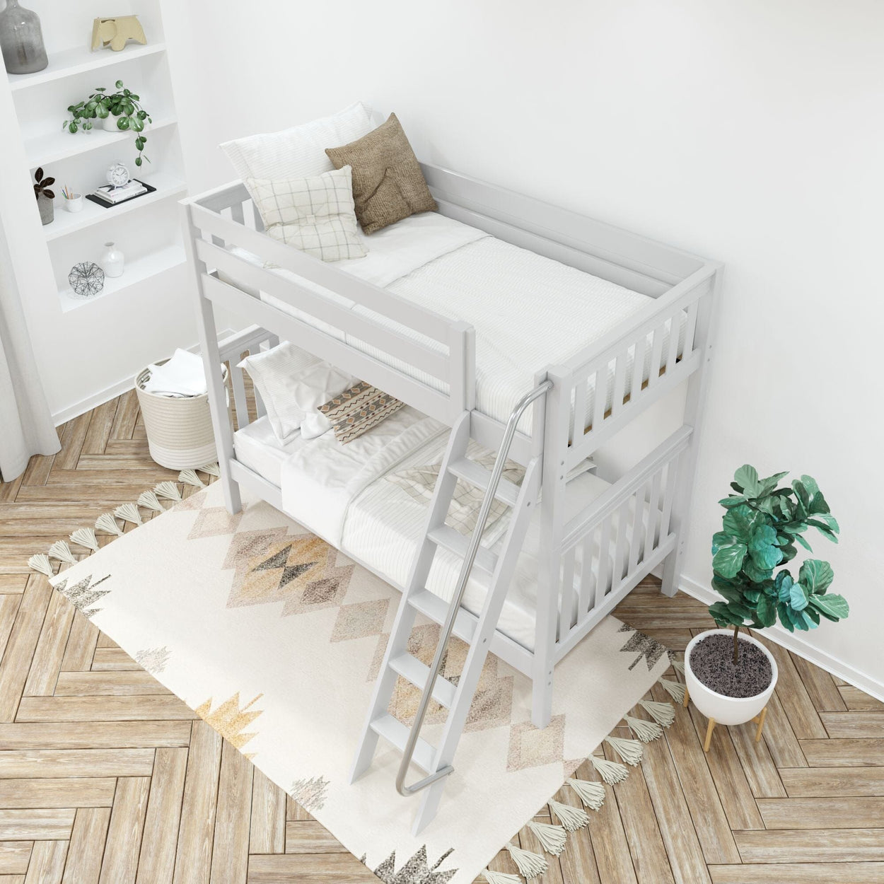 White wooden bunk bed with cozy pillows and blankets, placed in a modern bedroom with wooden flooring and geometric rug.
