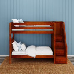 Wooden bunk bed with staircase and cozy bedding in a modern bedroom setting.