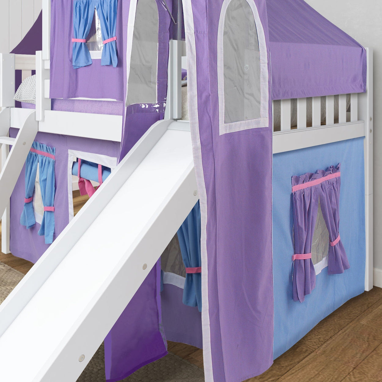 Purple and blue castle-themed kids' loft bed with slide and play curtain.