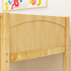 Wooden bed frame with light natural finish and colorful abstract wall art in the background.