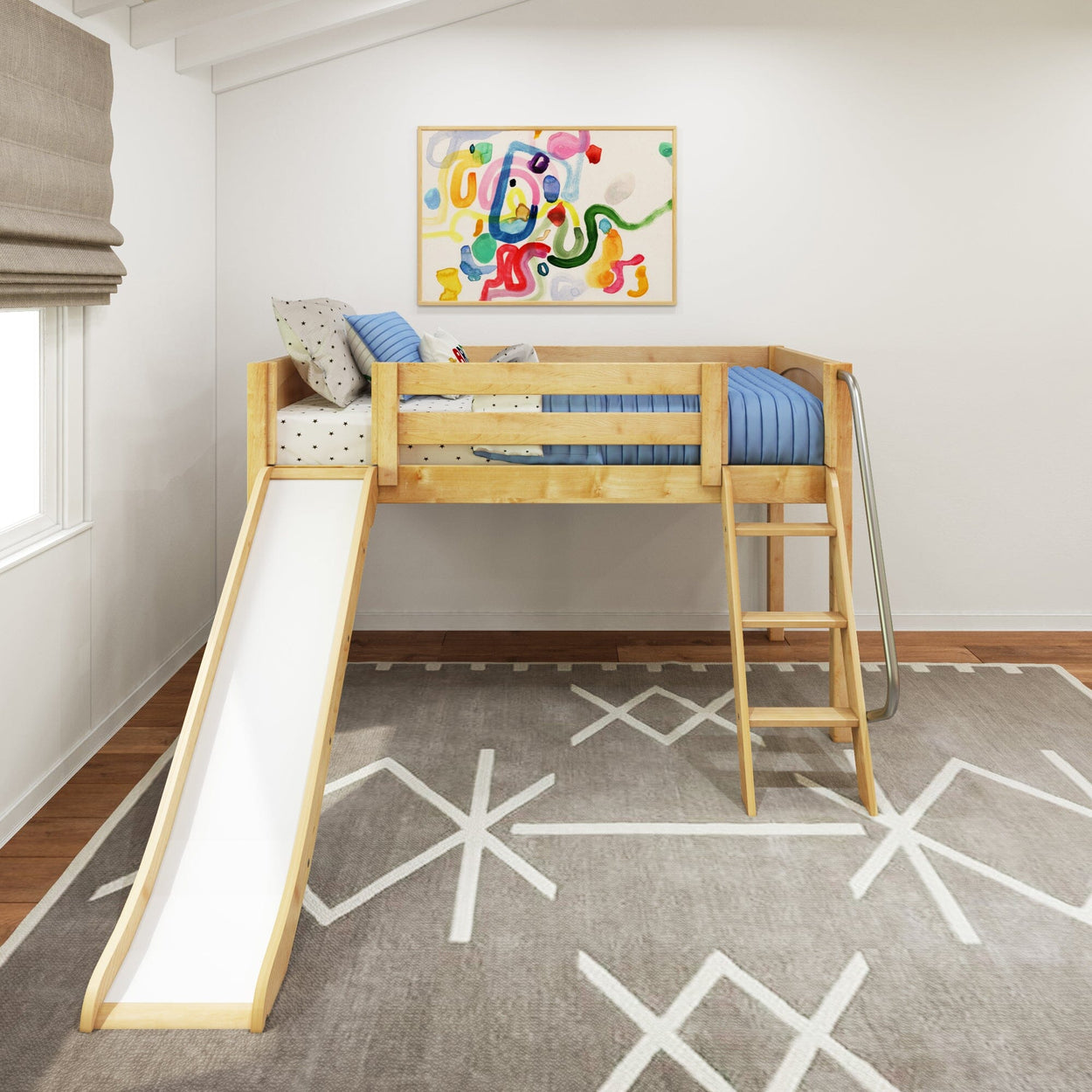 Children's loft bed with slide and ladder in a modern bedroom with abstract art and geometric rug.