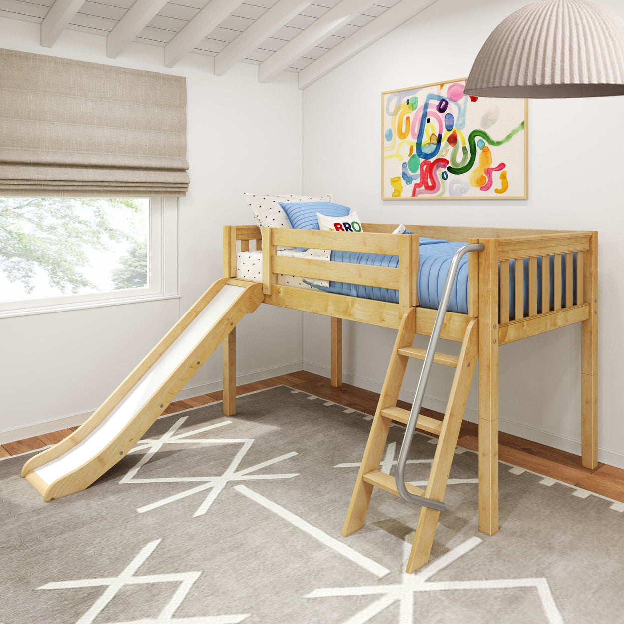 Children's wooden loft bed with slide and ladder in a bright playroom, featuring colorful abstract wall art.