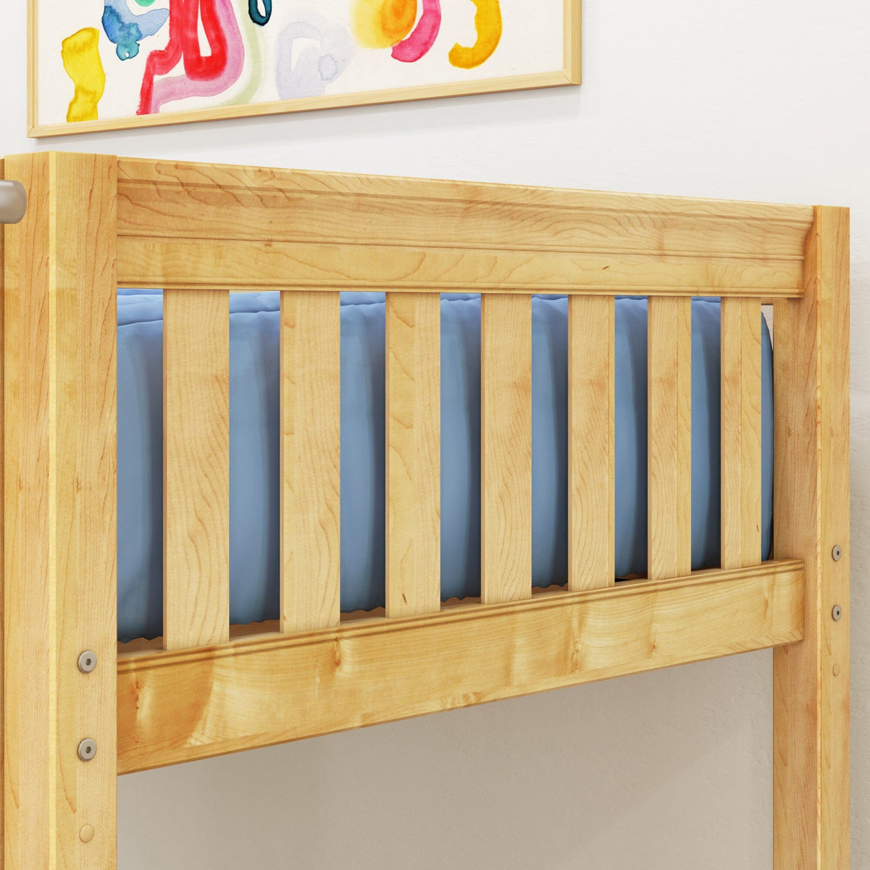Natural wood bunk bed frame with blue mattress and colorful artwork on wall.