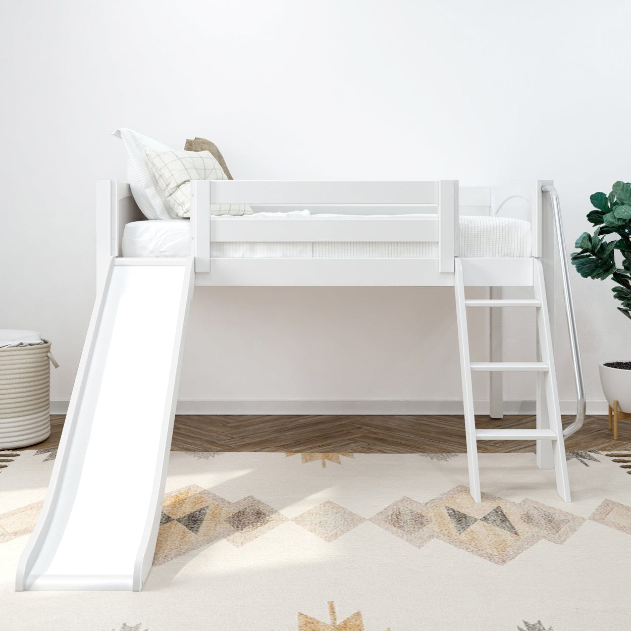 White kids loft bed with slide, wooden ladder, and stylish room decor.