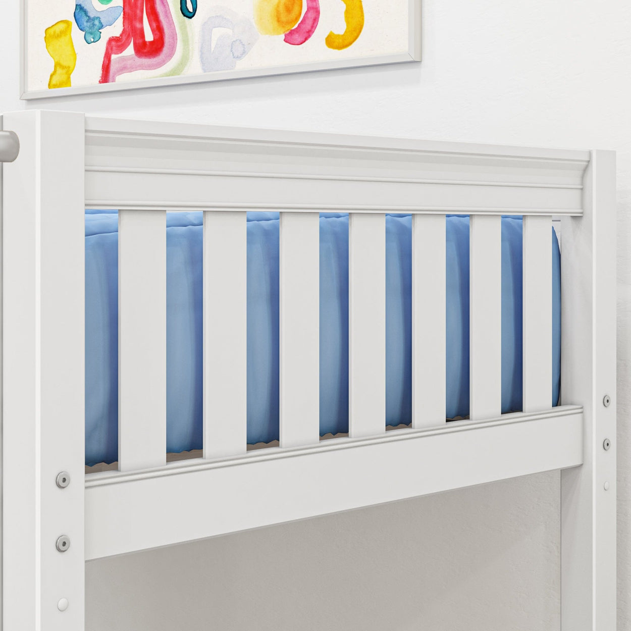 White wooden loft bed with blue bedding and colorful abstract wall art in a modern bedroom.