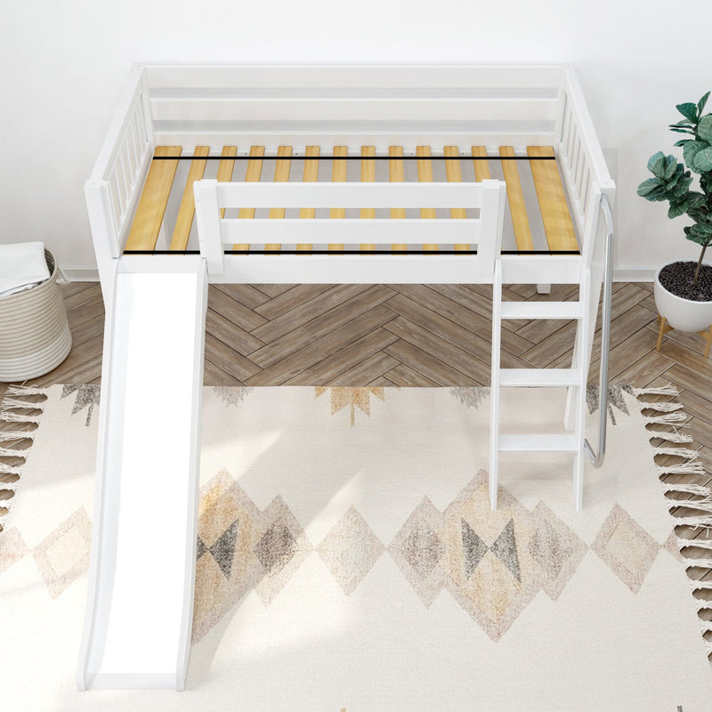 White kids loft bed with slide and ladder, exposed wooden slat mattress support on herringbone hardwood floor with patterned rug and potted plant