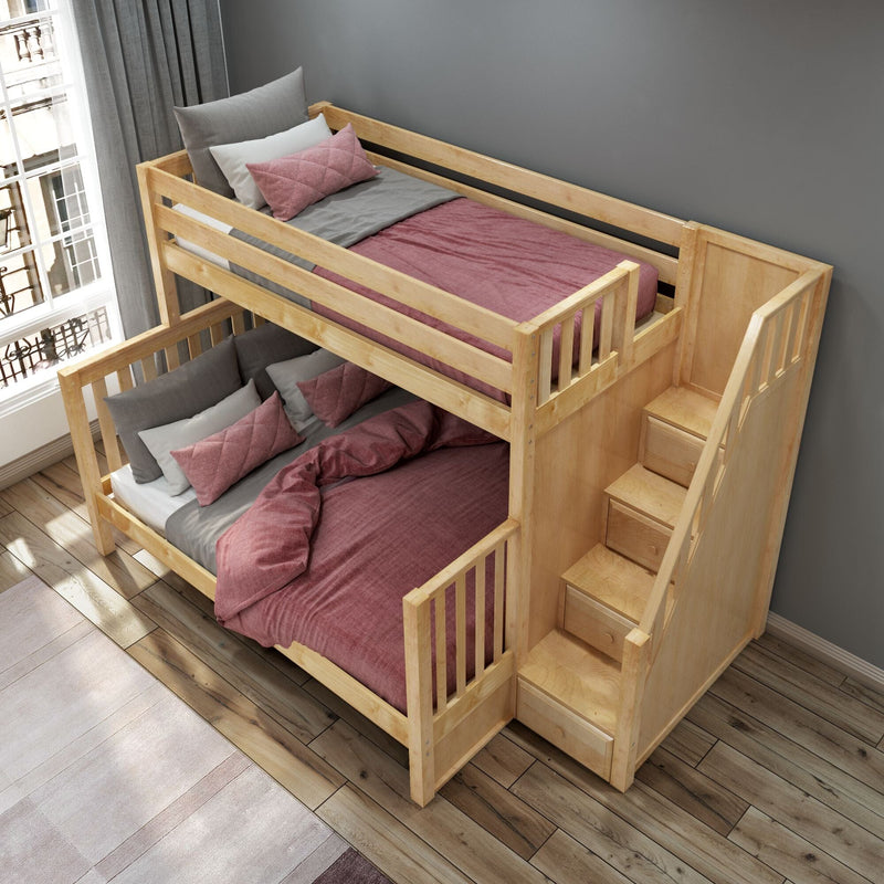 Modern natural wood two-level bunk bed with built-in staircase and storage drawers, styled with pink and gray bedding and quilted pillows in a space-saving children's bedroom by a large window