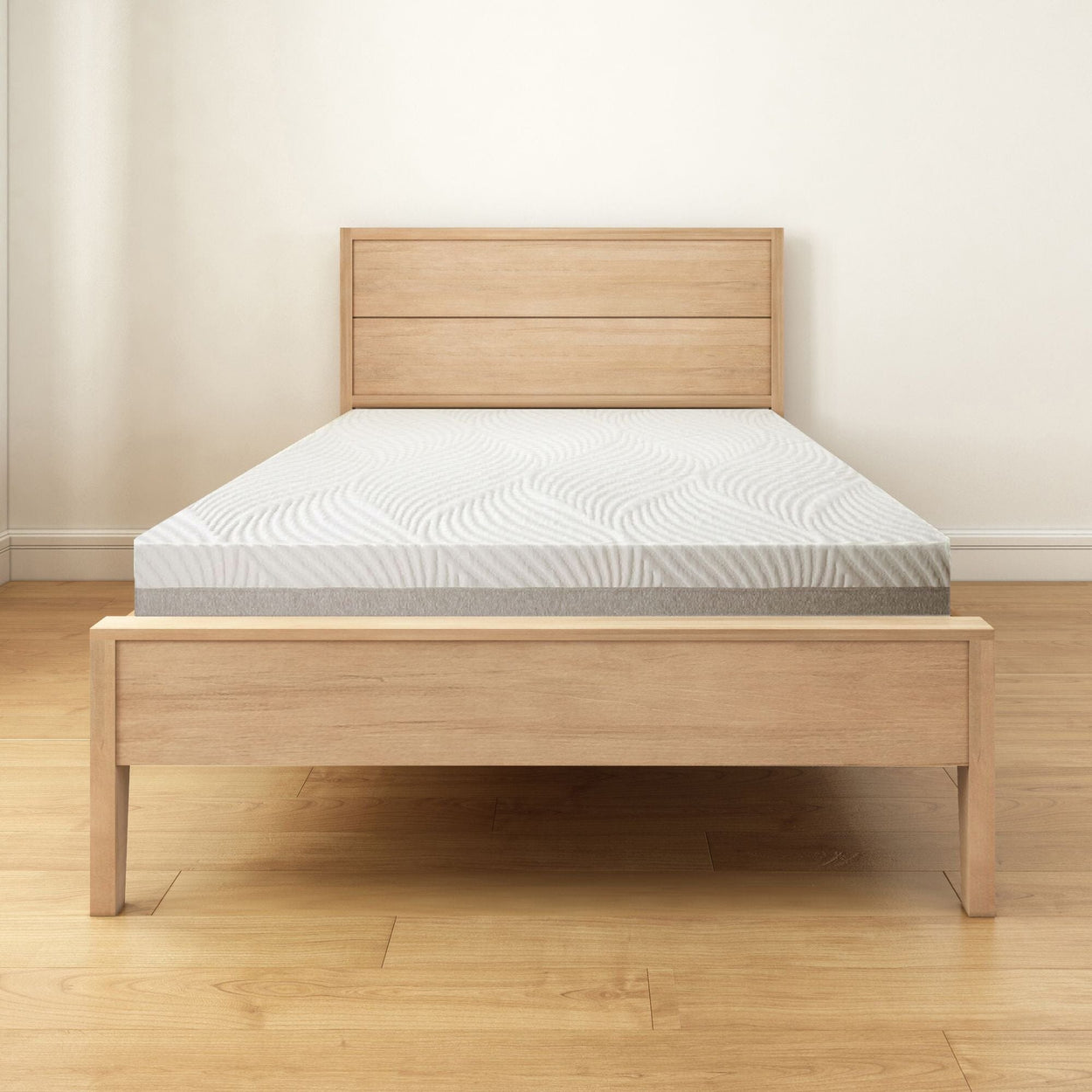 Modern wooden bed frame with a comfortable mattress in a minimalist bedroom setting.