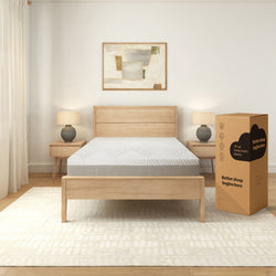 Modern bedroom with a wooden bed frame, comfortable mattress, and stylish decor.