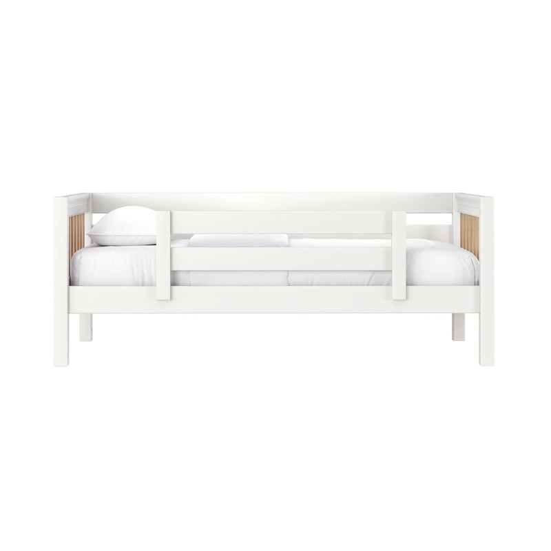 White wooden twin bunk bed with guardrail and wood slat accents, white bedding and pillows