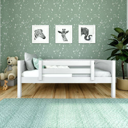Children's bedroom with a white bed, star-patterned green wallpaper, framed animal art, and cozy decor.