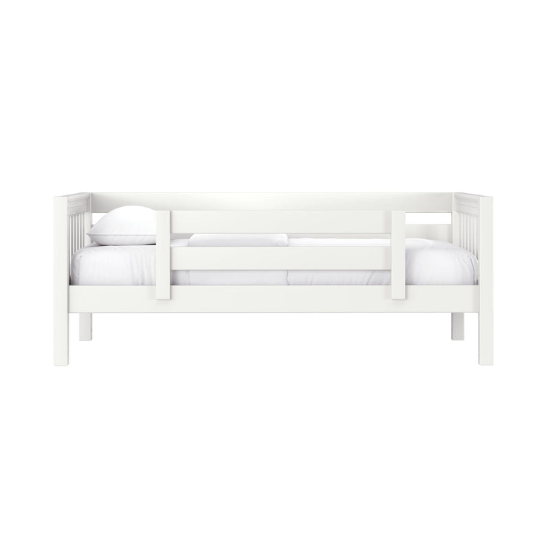 White wooden toddler daybed with safety rails, white mattress and pillow, modern minimalist children's bedroom furniture
