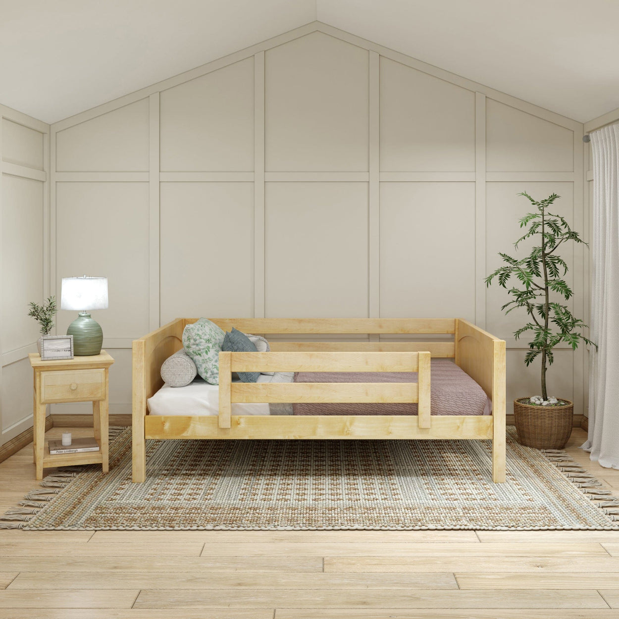Cozy minimalist bedroom with a light wood bed, nightstand, green plant, and woven rug.