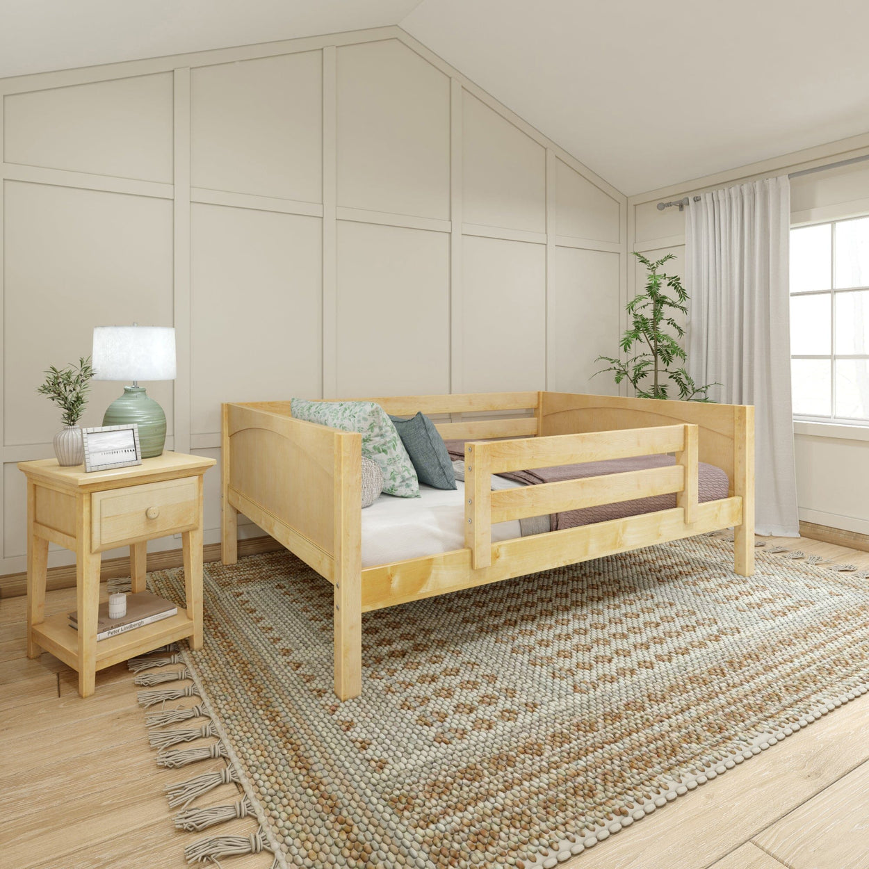 Cozy bedroom interior with wooden daybed, nightstand, and decorative area rug in modern farmhouse style.