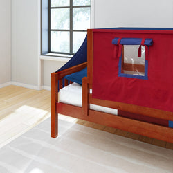 Children's wooden bed with a red and blue tent canopy and natural light streaming through a window.