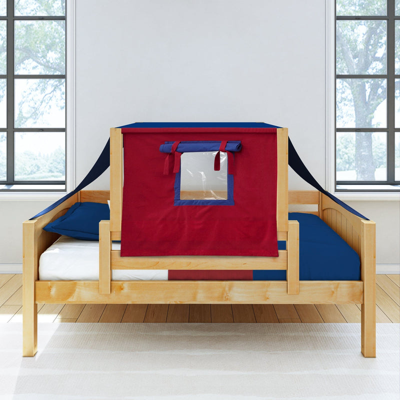 Kids' wooden single bed with red and navy play tent canopy, blue bedding and pillow in bright bedroom with large windows