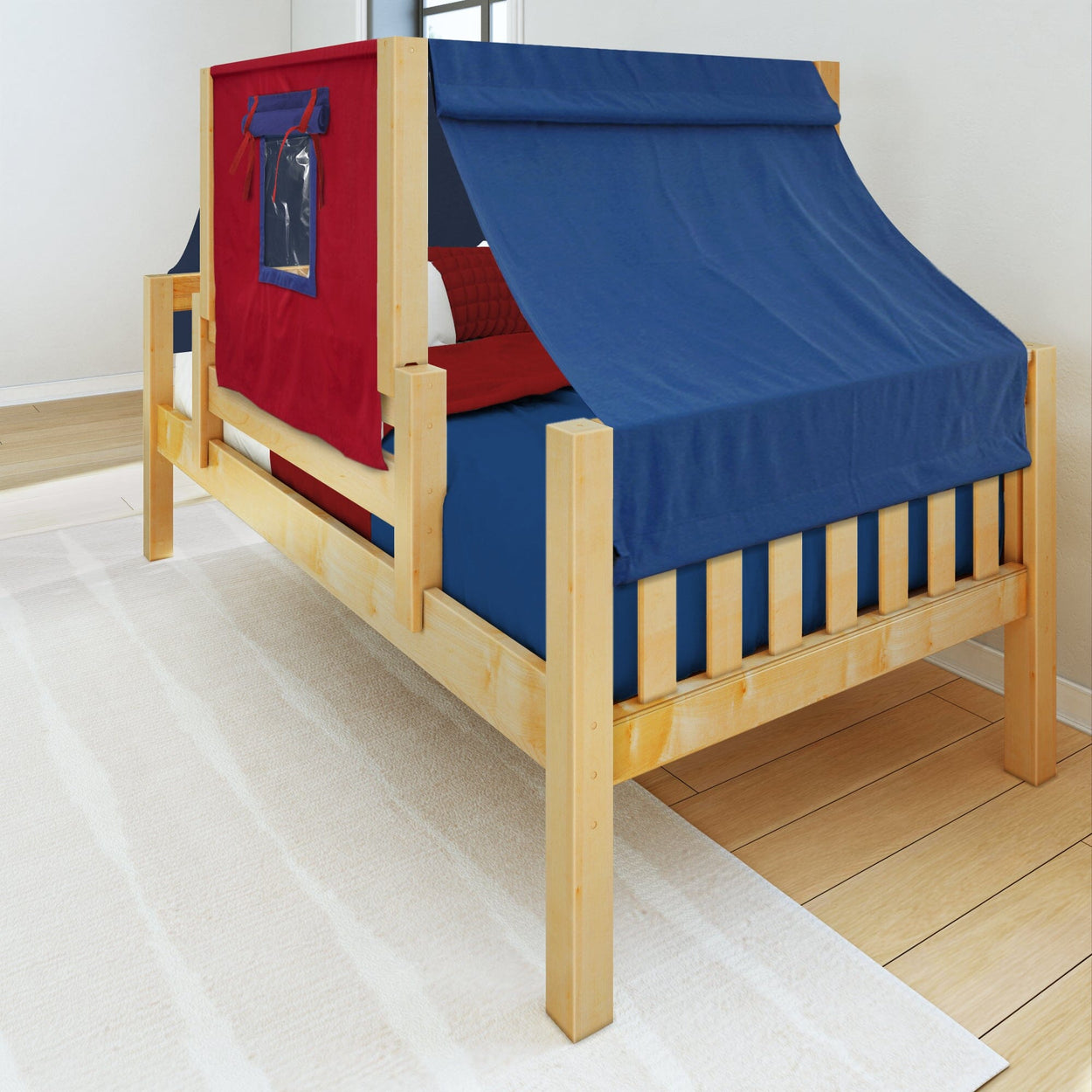 Children's wooden play bed with blue and red tent style canopy.