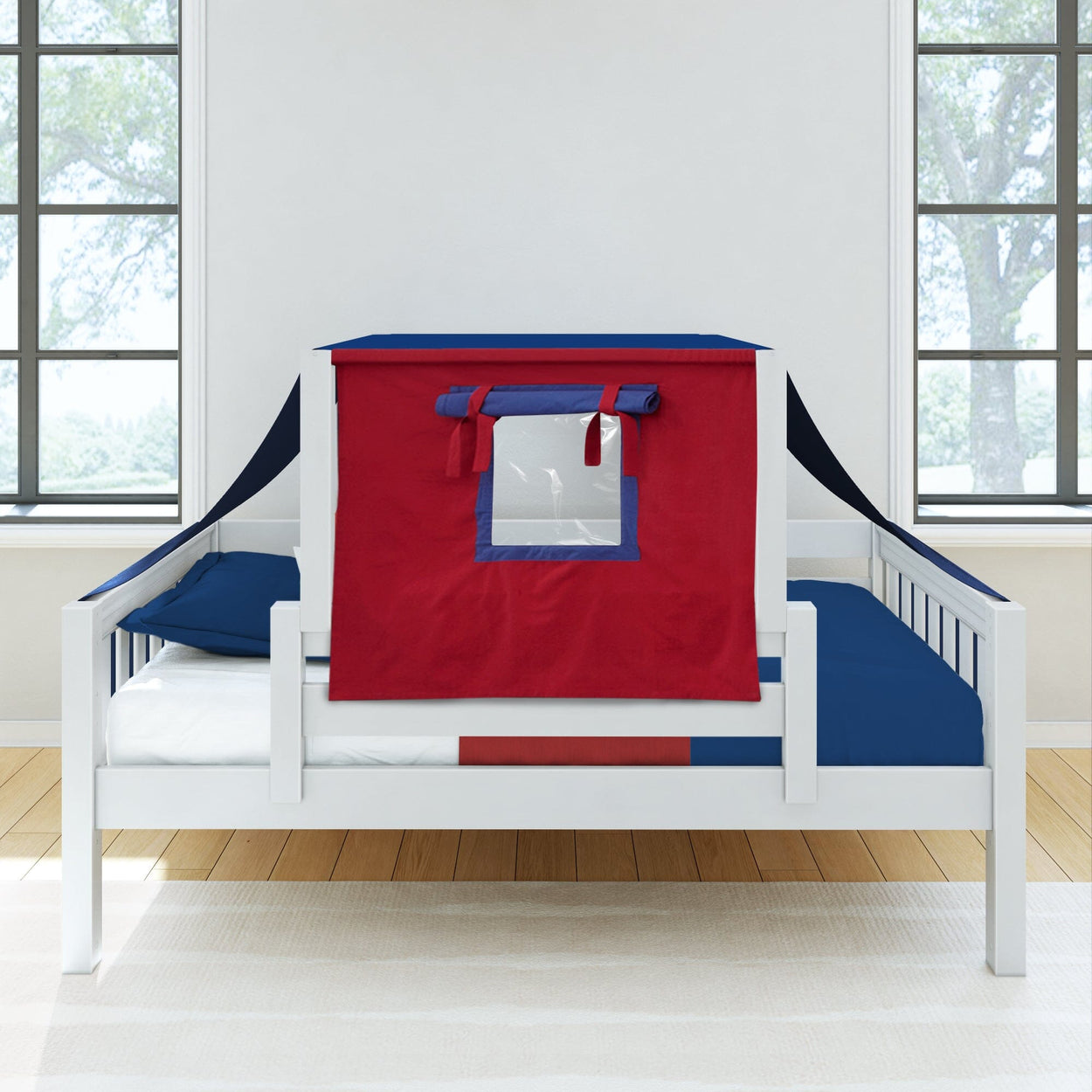 Children's white bed with blue bedding and red play tent in bright room.