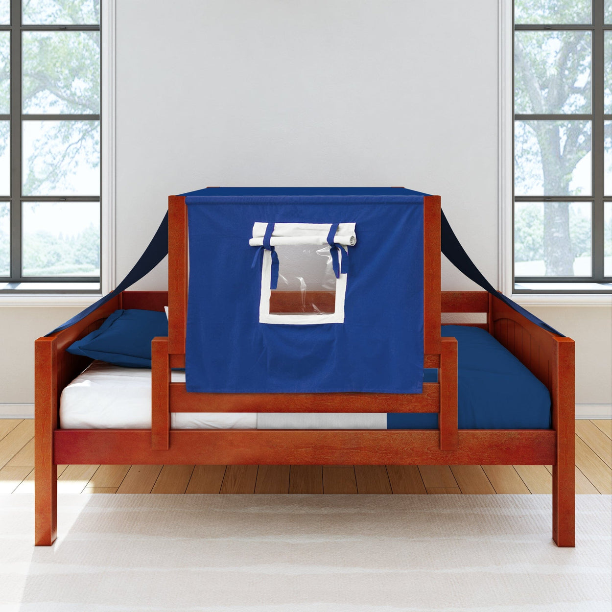 Wooden loft bed with blue tent and window in a bright room.