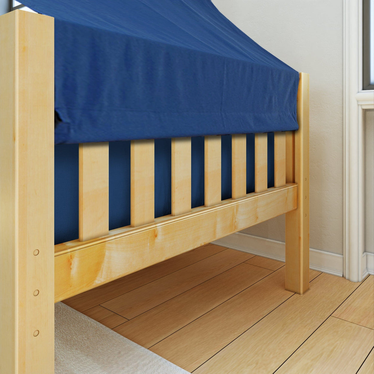 Wooden bed frame with blue mattress, modern bedroom furniture.