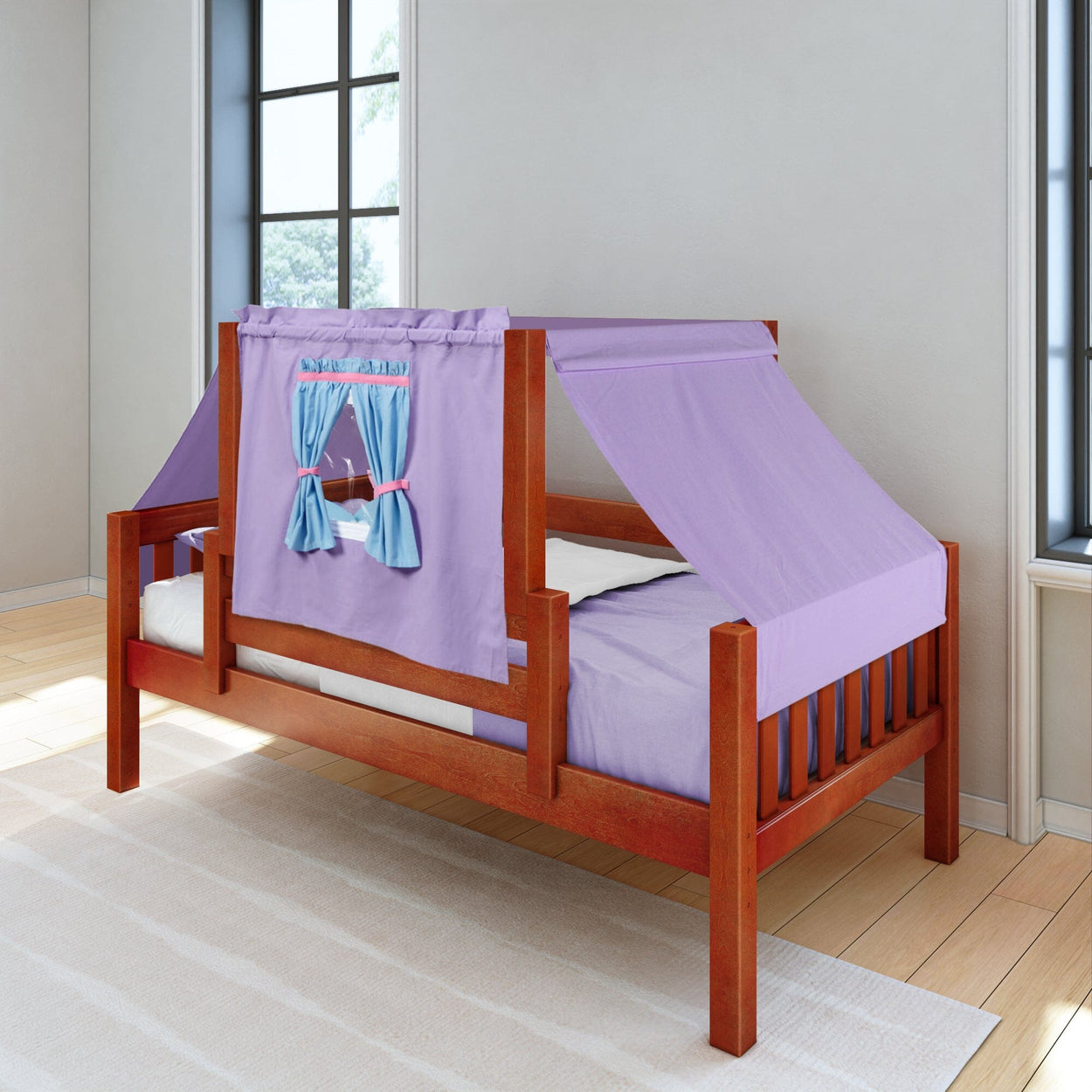 Wooden toddler bed with purple tent and window curtains, perfect for kids' bedroom decor.