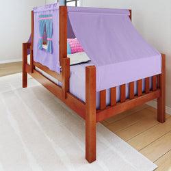 Wooden loft bed with purple tent canopy and colorful bedding in a bright bedroom.