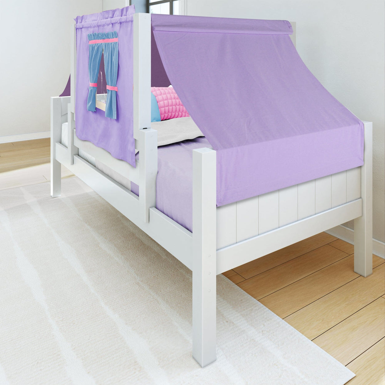 Children's white bed with purple canopy and curtain, wooden floor and cozy textile.