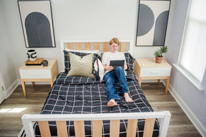 Modern platform bed frame with nightstands in boys bedroom
