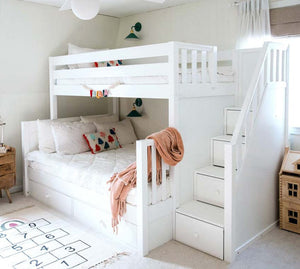 Solid hardwood white twin over twin bunk bed in girls shared room