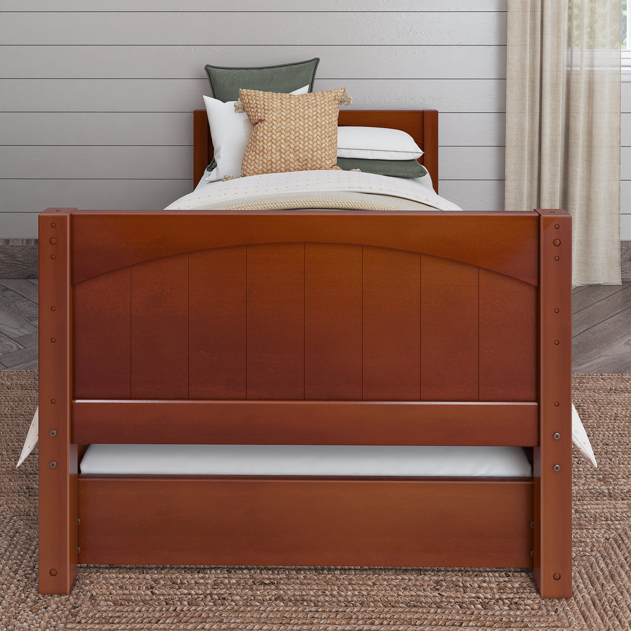 Stylish wooden bed frame with cozy bedding in modern bedroom setting.
