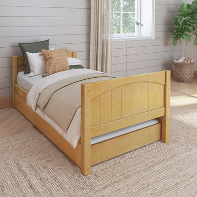 Stylish wooden bed with neutral bedding and decorative pillows in a cozy bedroom featuring natural light from a window and a potted plant for a serene atmosphere.