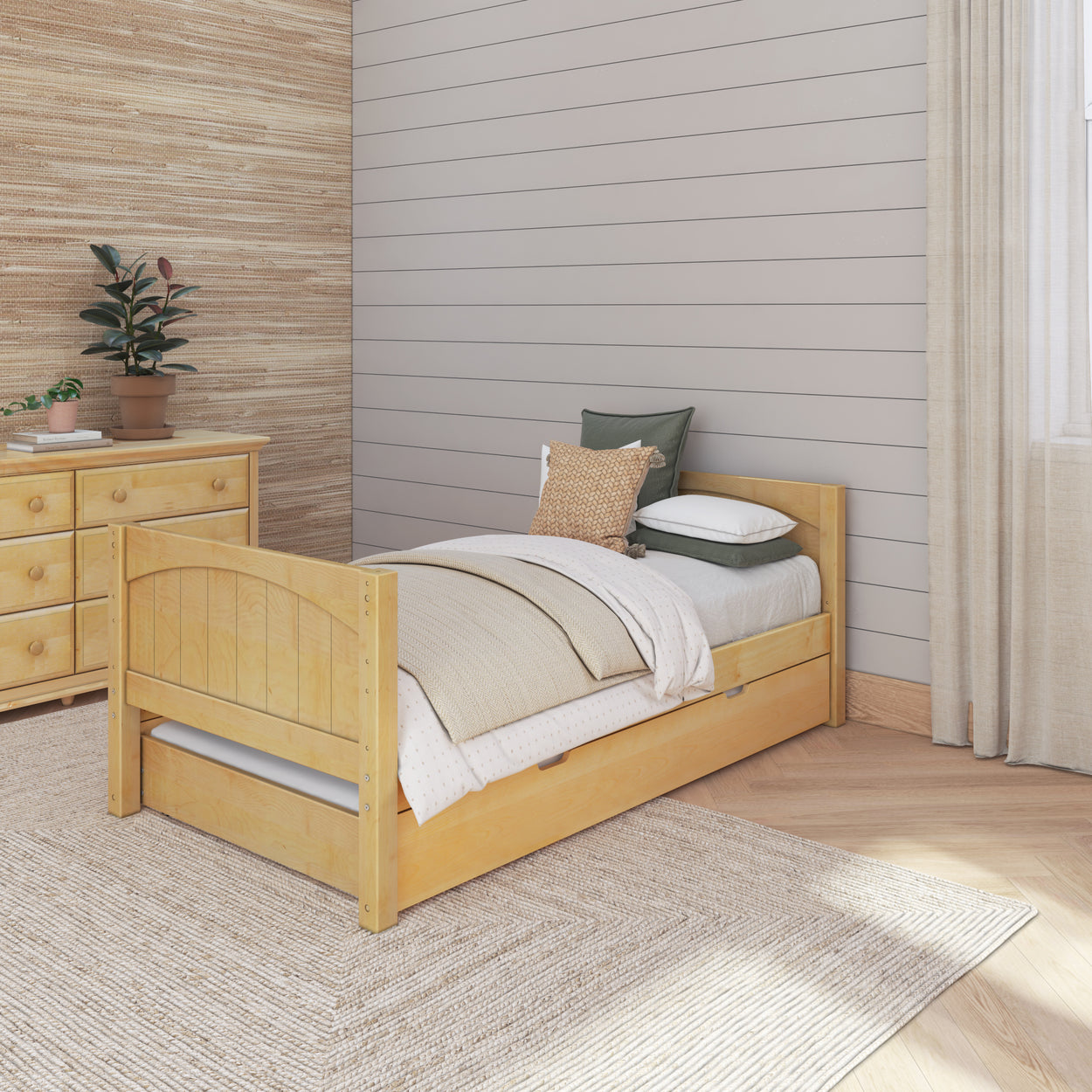 Cozy modern bedroom with wooden twin bed frame, neutral bedding, and shiplap accent wall.