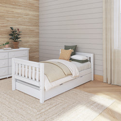 Cozy bedroom with a white wooden twin bed and dresser, featuring green and beige decor for a serene atmosphere.