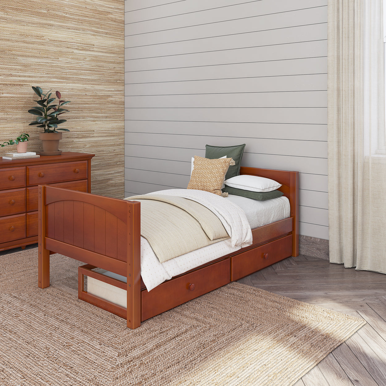 Wooden twin bed with storage drawers in a cozy bedroom setting with natural light and warm decor.