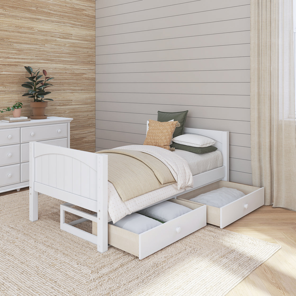 Single white wooden bed with storage drawers in a cozy bedroom setting.