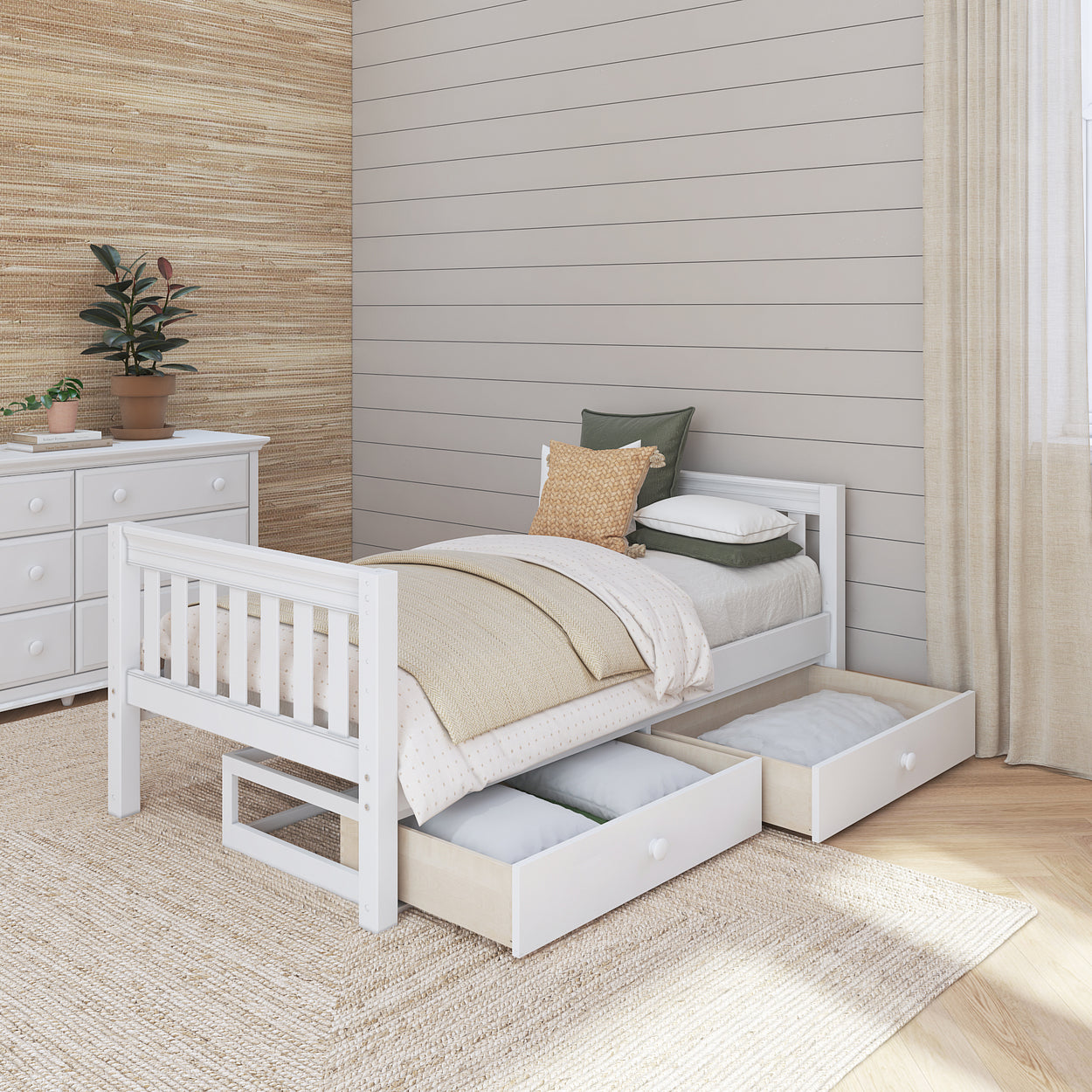 White wooden twin bed with storage drawers in a cozy, modern bedroom setting.
