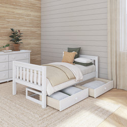 White wooden twin bed with storage drawers in a cozy, modern bedroom setting.