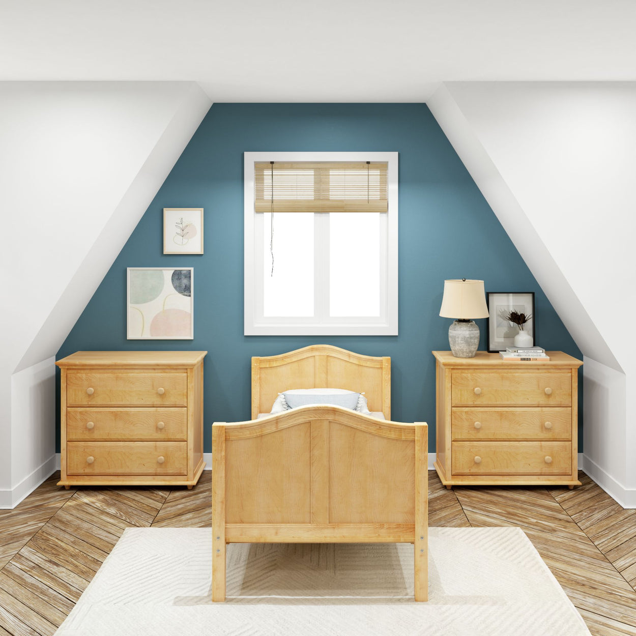 Attic bedroom with blue accent wall, wooden bed, matching dressers, and decorative artwork.