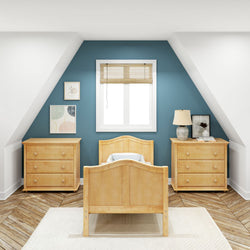 Attic bedroom with blue accent wall, wooden bed, matching dressers, and decorative artwork.