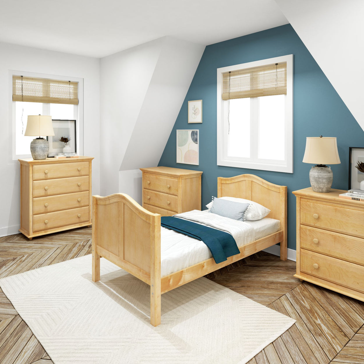 Cozy attic bedroom with natural wood furniture, blue accent wall, and tasteful decor.