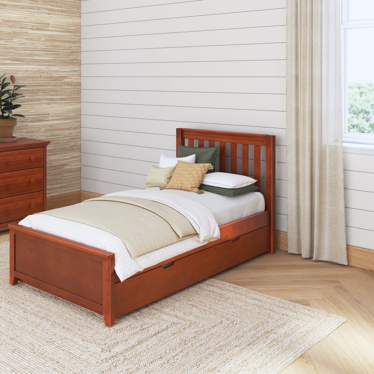 Single wooden bed with decorative pillows in modern bedroom setting.